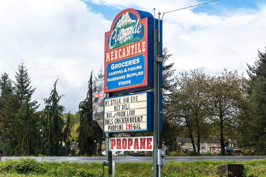 Cascade Mercantile Sign On SR 20 Photograph by Tom Cochran