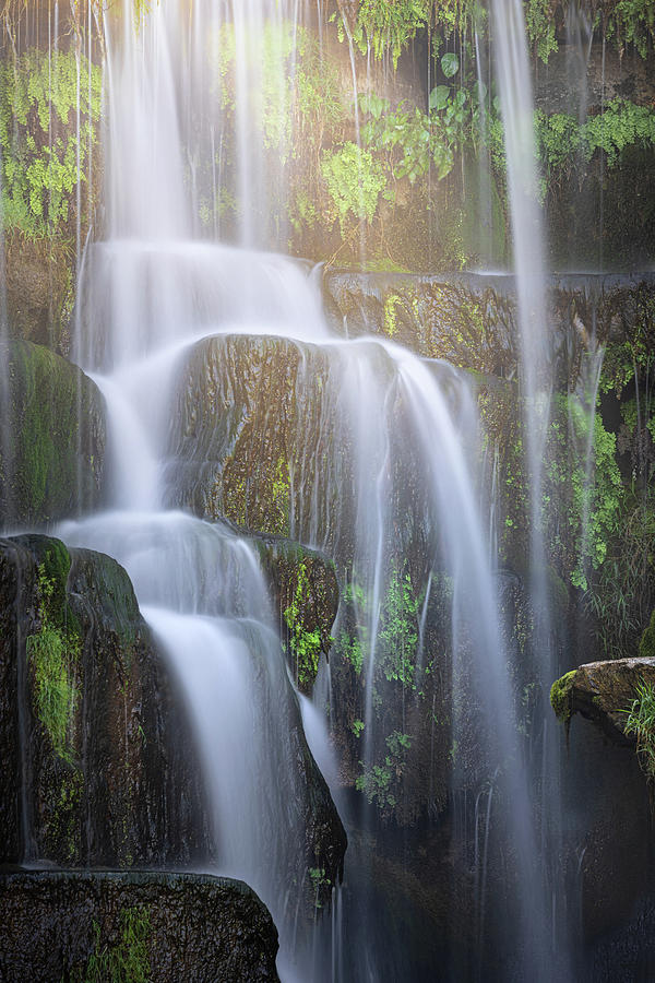 Cascading Over Boulders Photograph