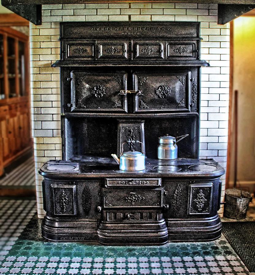 Cast Iron Stove Photograph by Catherine Melvin