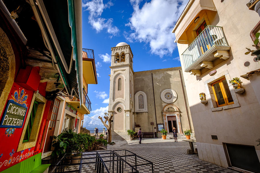 Castelmola, Taormina, Italy - November 8, 2019: Front of The Church of San Giorgio, pizzeria on the left side Photograph by Finn Bjurvoll Hansen