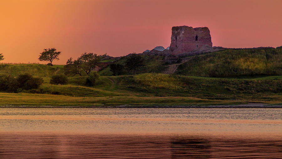 Castle ruin in beautiful sunset Photograph by Karlaage Isaksen