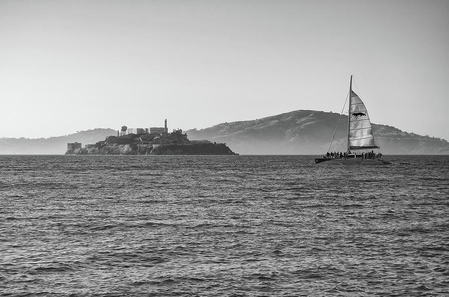 Catamaran Sailing by Alcatraz Island San Francisco Black and White Photograph by Shawn OBrien