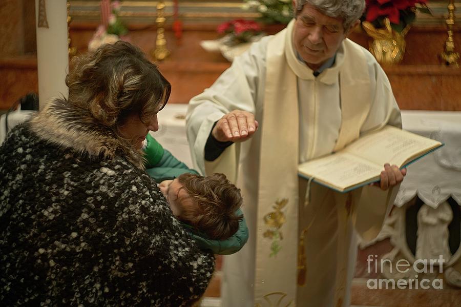 Catholic priest celebrates baptism 5 Photograph by Filippo Carlot - Pixels