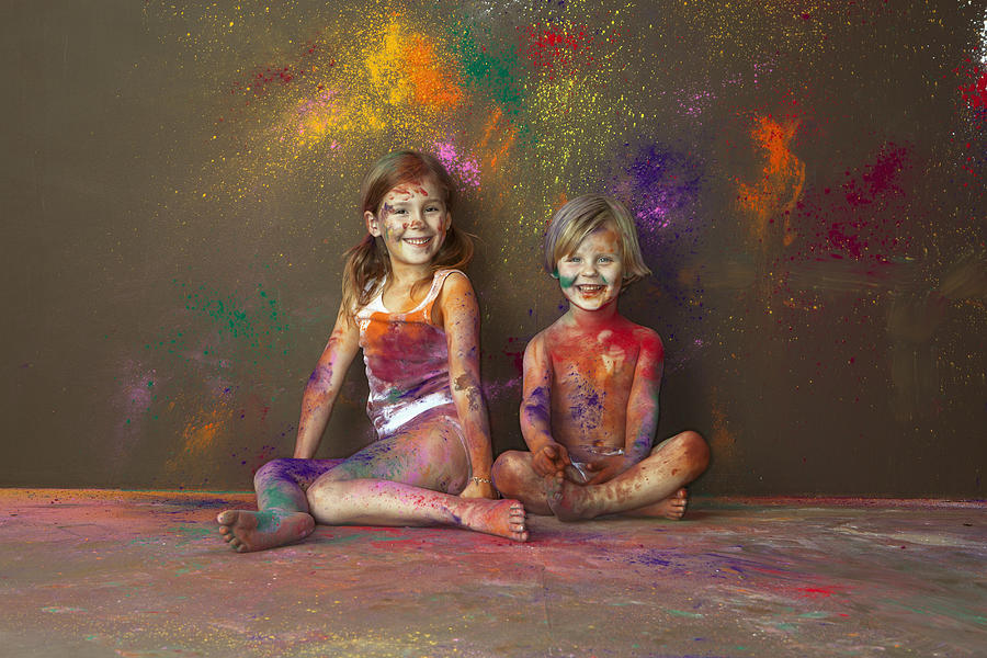 Caucasian children playing with paint Photograph by King Lawrence