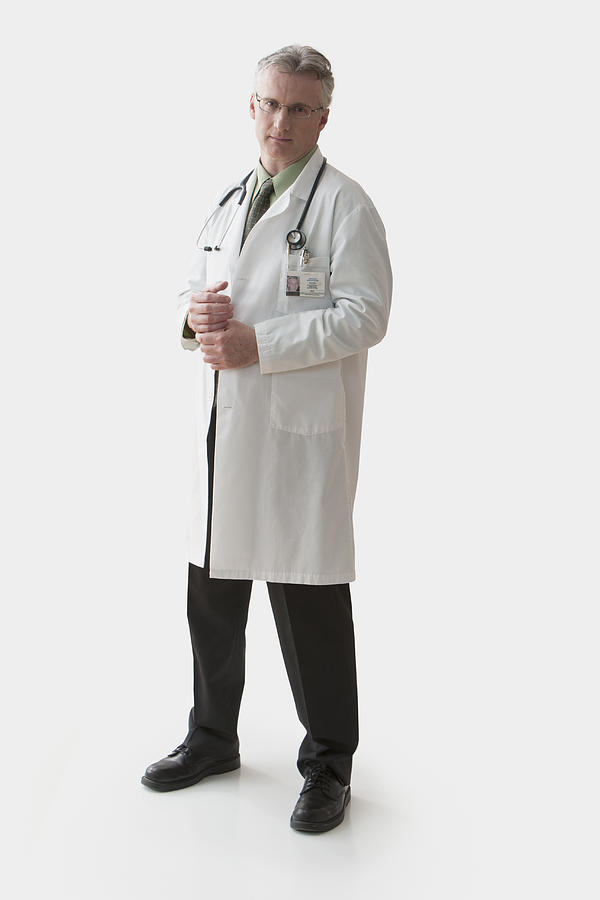 Caucasian doctor in lab coat Photograph by Jose Luis Pelaez Inc