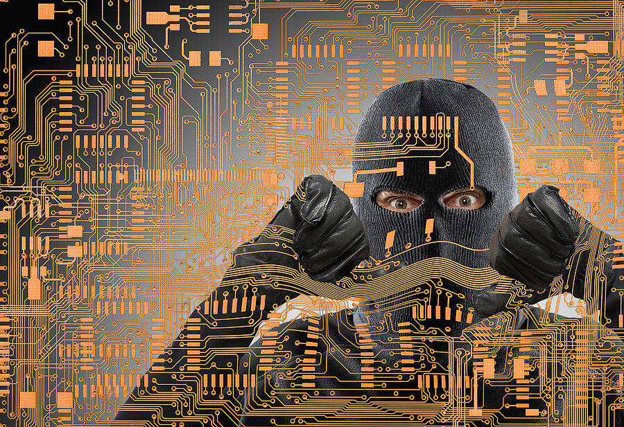 Caucasian man in ski mask behind microchip pattern Photograph by John M Lund Photography Inc