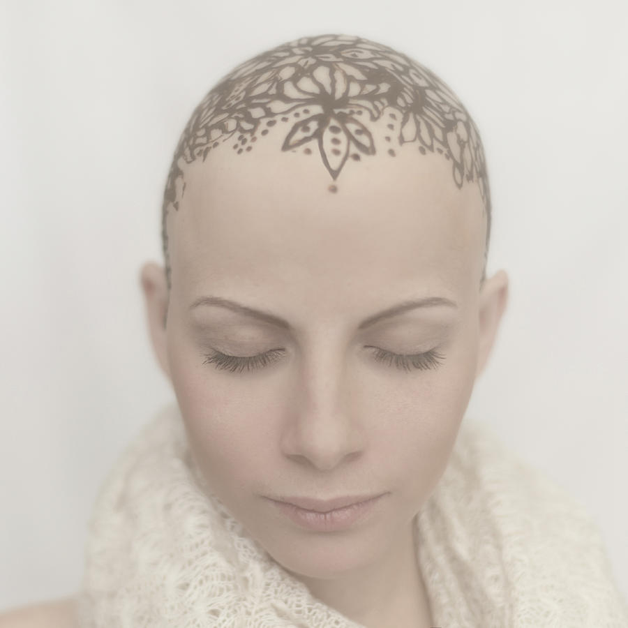 Caucasian woman with bald tattooed head Photograph by Vladimir Serov