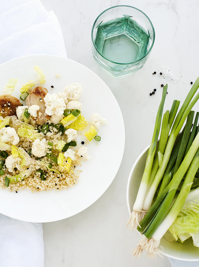 Cauliflower salad dish and spring onions meal Photograph by Cultura RM Exclusive/Magdalena Niemczyk - ElanArt