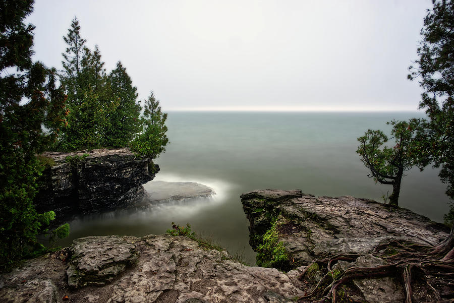 Cave Point Calm 2 -  Cave Point County Park in Door County WI Photograph by Peter Herman