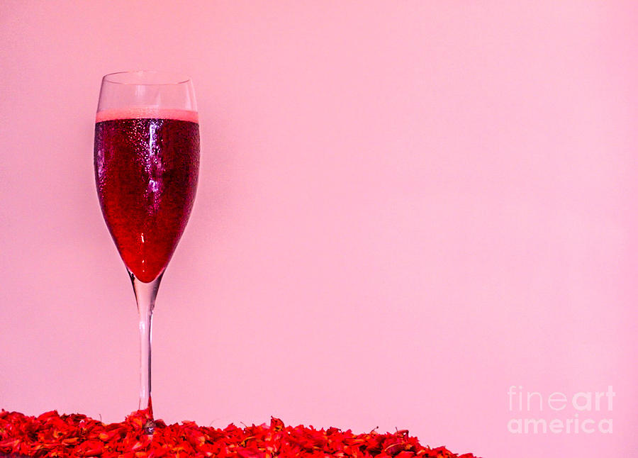 Celebrate with sparkling sangria and red flowers  Photograph by Natalia Wallwork