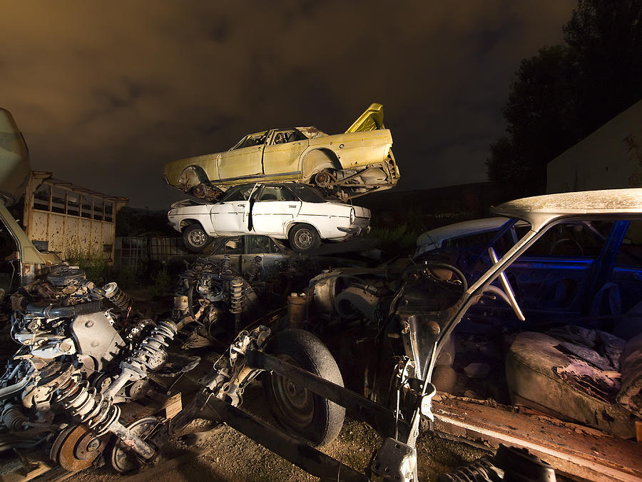 Cemetery of cars for his recycling I dress in the night Photograph by Jose A. Bernat Bacete