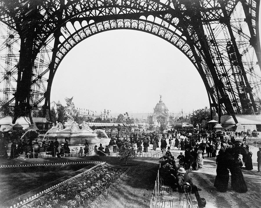 Central Dome seen through the base of the Eiffel Tower and crowd on the ...