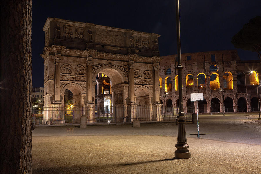 Colosseum Photograph - Arch of Constatine and the Colosseum seen at night. by Steve Bisgrove