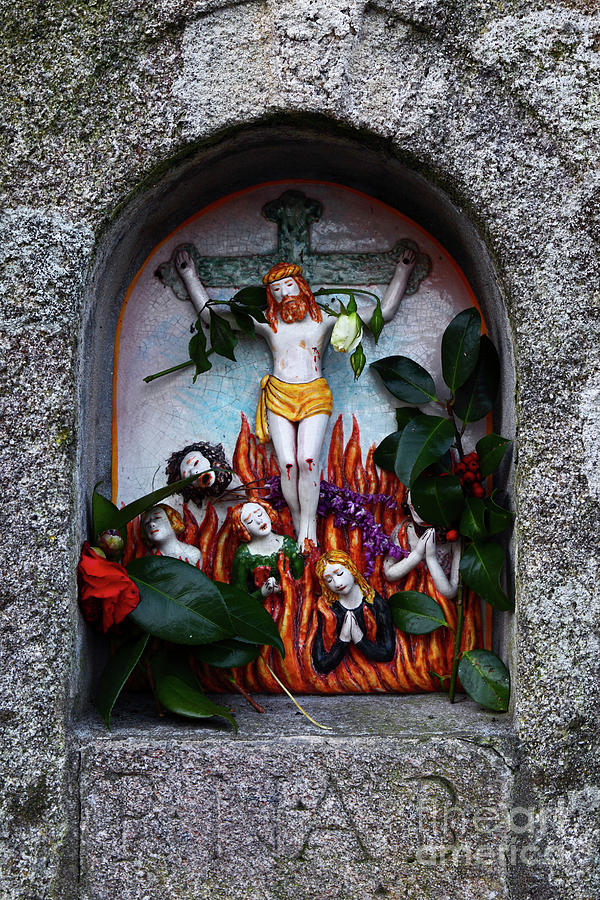 Jesus Christ Photograph - Ceramic crucifixion scene in stone wall Portugal by James Brunker