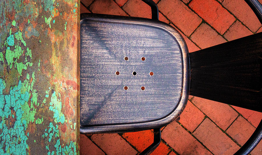 Chair And Table On The Street Photograph by Gary Slawsky