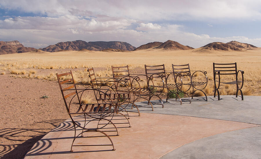Chairs on terrace in semi-arid area. Photograph by Annick Vanderschelden Photography