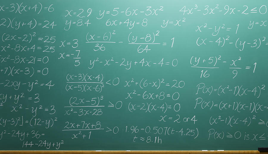 Chalk equations filling blackboard Photograph by Jeffrey Coolidge