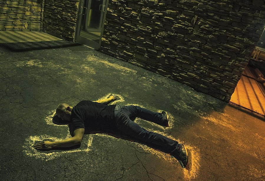 Chalk outline of body of Caucasian victim on pavement Photograph by Kirk Marsh