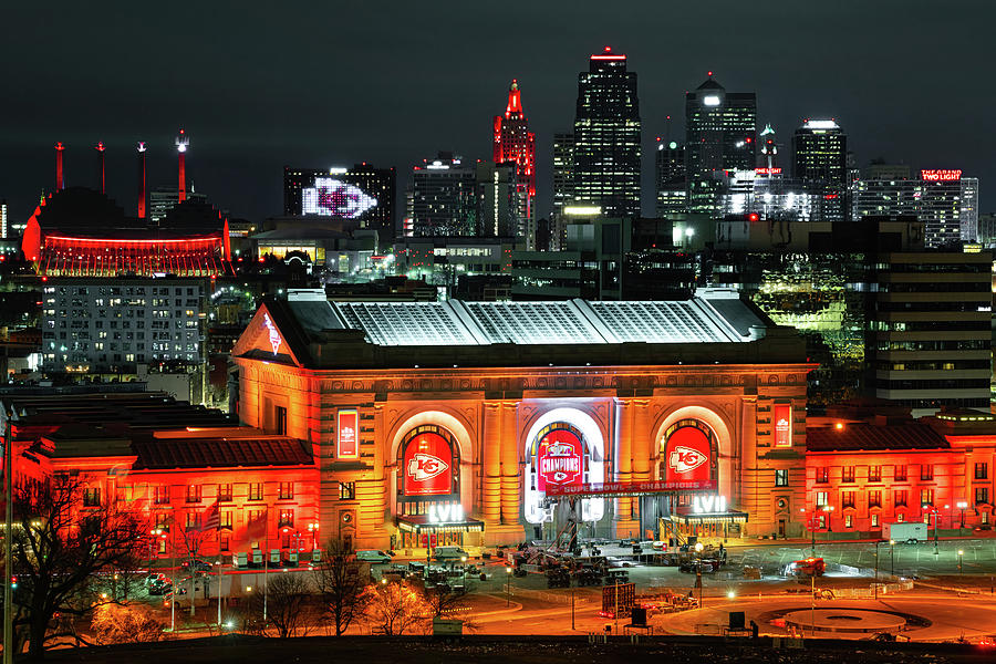 Champions In The Night - A Glowing Tribute To Kansas City Football Photograph by Gregory Ballos
