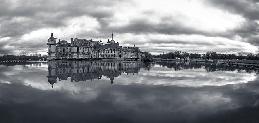 Chantilly Castle and pond, black and white panorama Photograph by Jean-Luc Farges