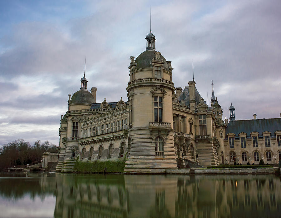 Chantilly Castle at dusk Photograph by Jean-Luc Farges