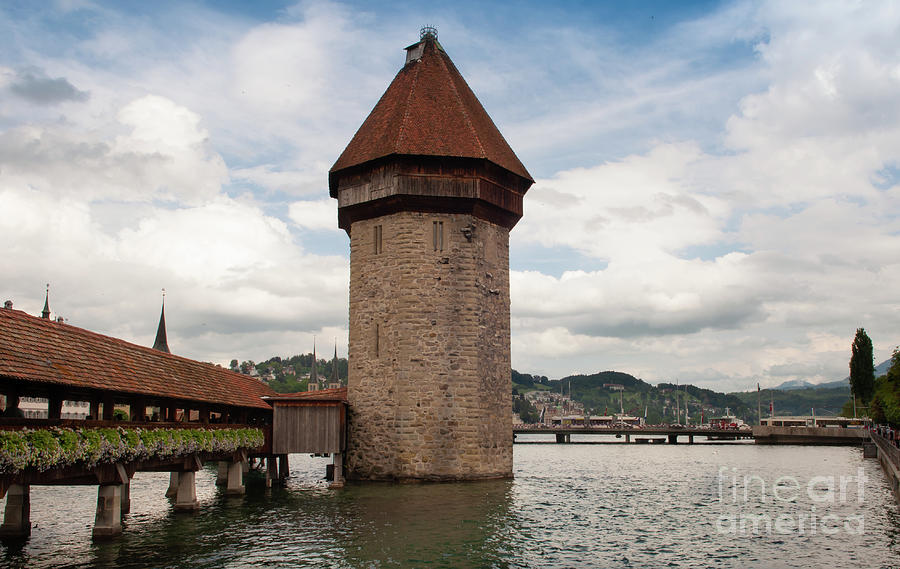 Chapel bridge tower in Old town Lucerne Switzerland Photograph by Dejan Jovanovic