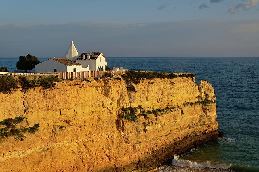 Chapel Nossa Senhora da Rocha on the cliffs in Algarve Photograph by Angelo DeVal