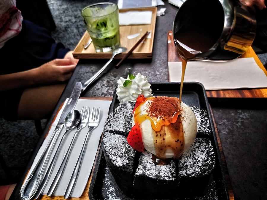 Charcoal honey toast with vanilla icecream and strawberry on top Photograph by Zcenerio