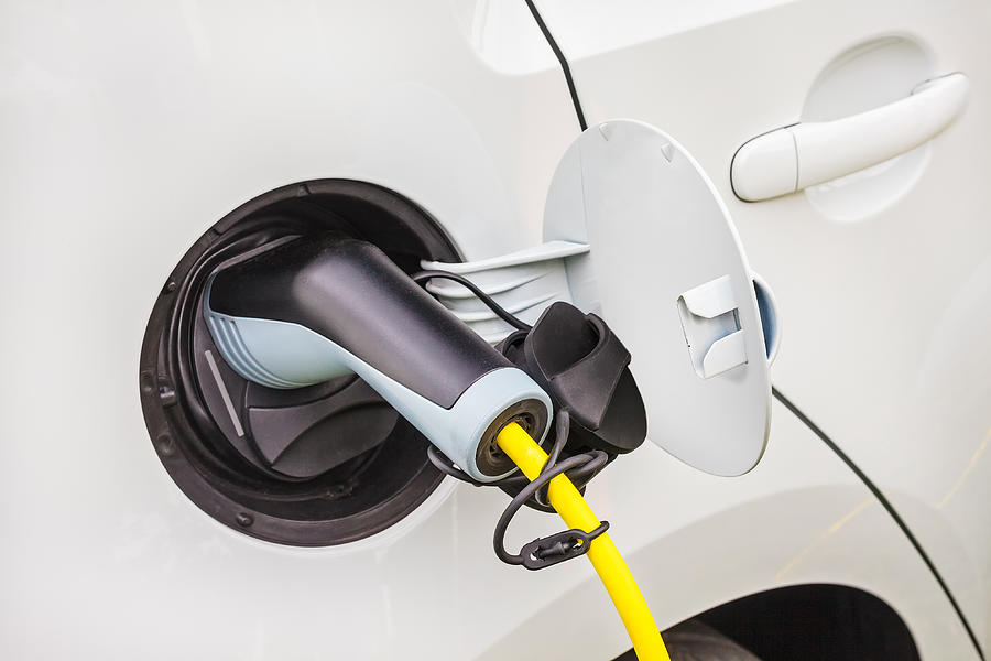 Charging of an electric car Photograph by DutchScenery
