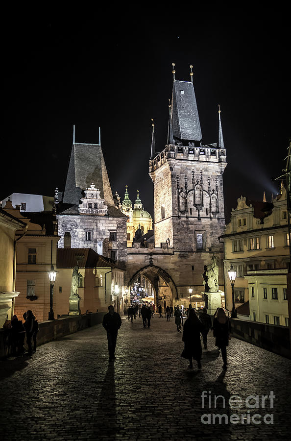 Charles Bridge Illuminated In The Night In Prague In The Czech Republic Photograph by Andreas Berthold