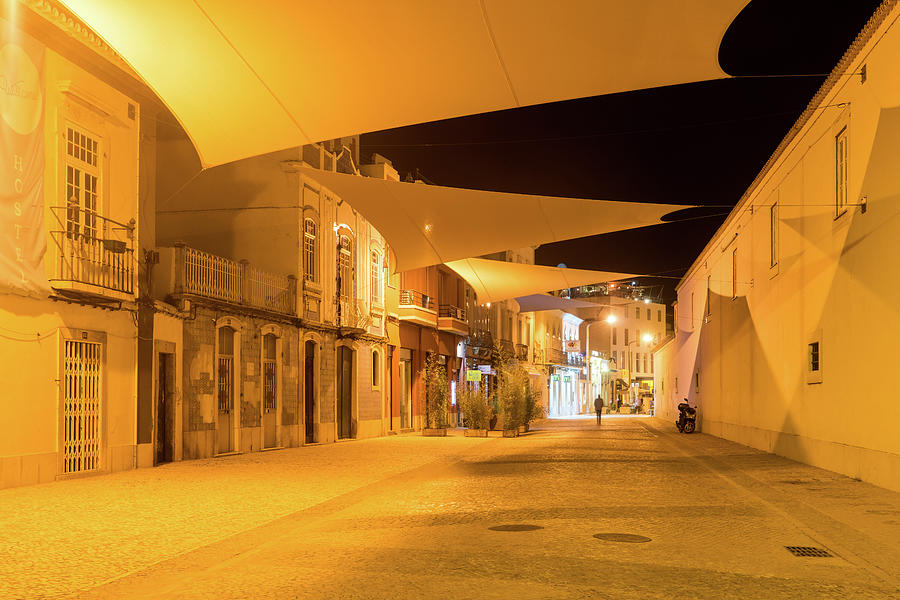 Charming Faro Algarve Portugal - Golden Yellow Streetlights and Cool Canvas Awnings Photograph by Georgia Mizuleva