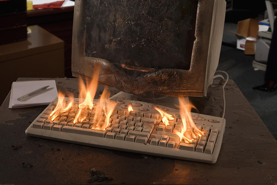Charred computer terminal and flaming keyboard (Digital Composite) Photograph by Tim Macpherson