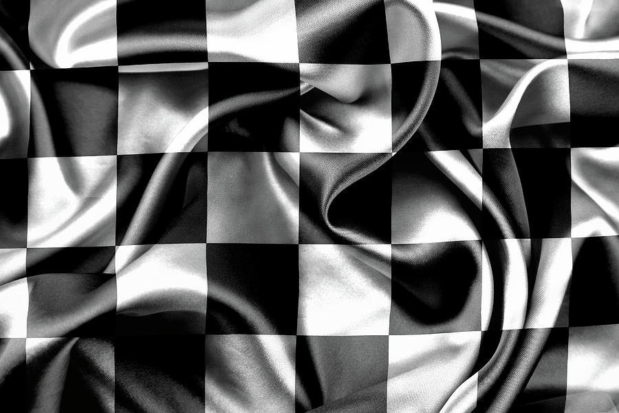 Black And White Photograph - Checkered racing flag by Les Cunliffe