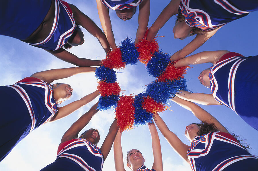 Cheerleaders Holding Pom-Poms Photograph by Zia Soleil