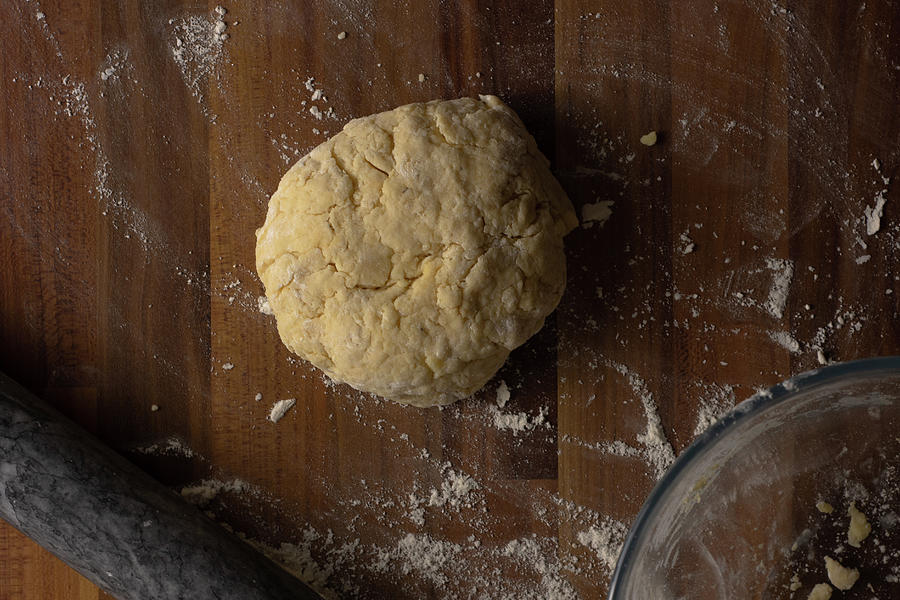 Cheese scone dough on a wooden surface Photograph by Scott Lyons