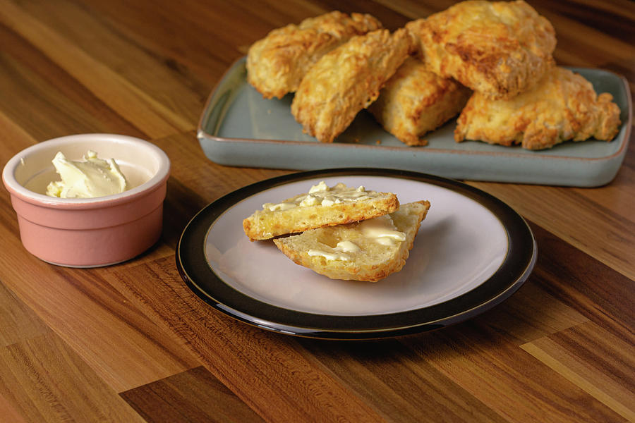 Cheese scones on a plate Photograph by Scott Lyons