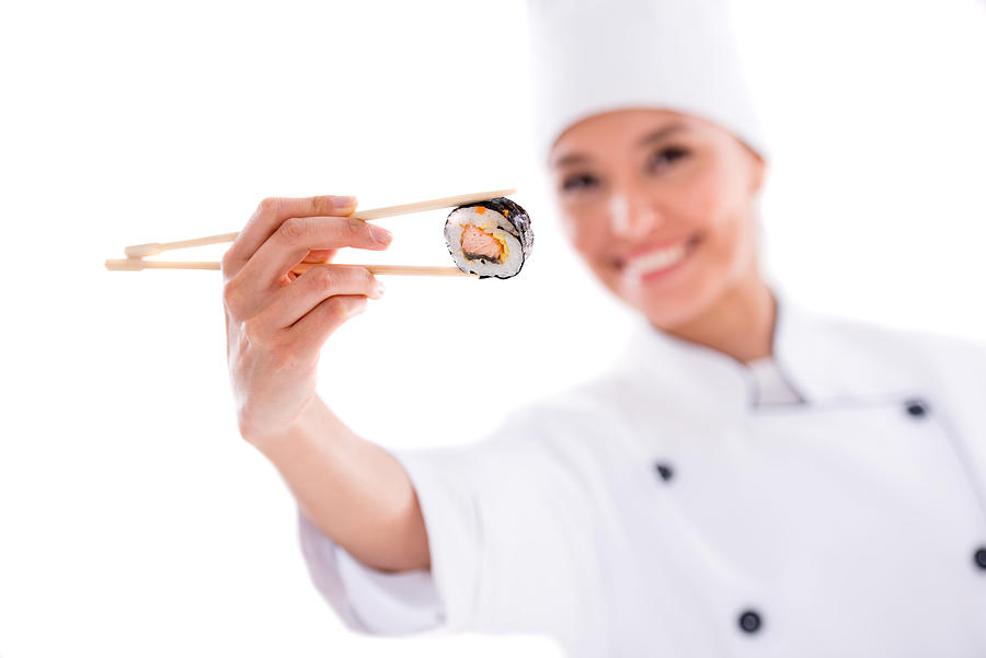 Chef holding sushi Photograph by Andresr