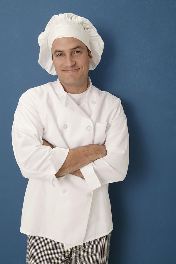 Chef with arms crossed Photograph by Comstock Images