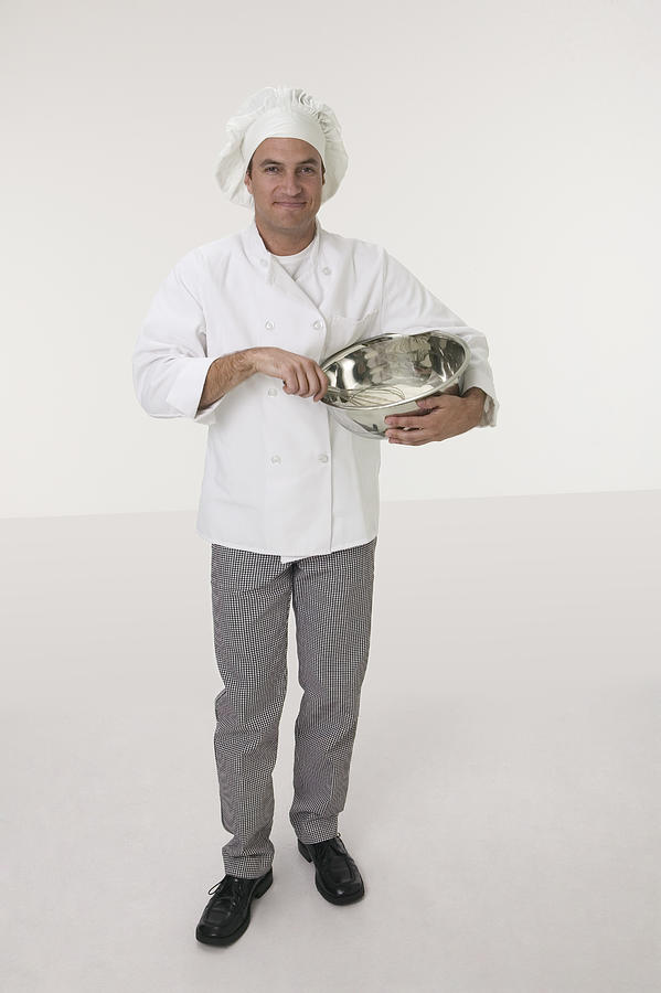 Chef with bowl Photograph by Comstock Images