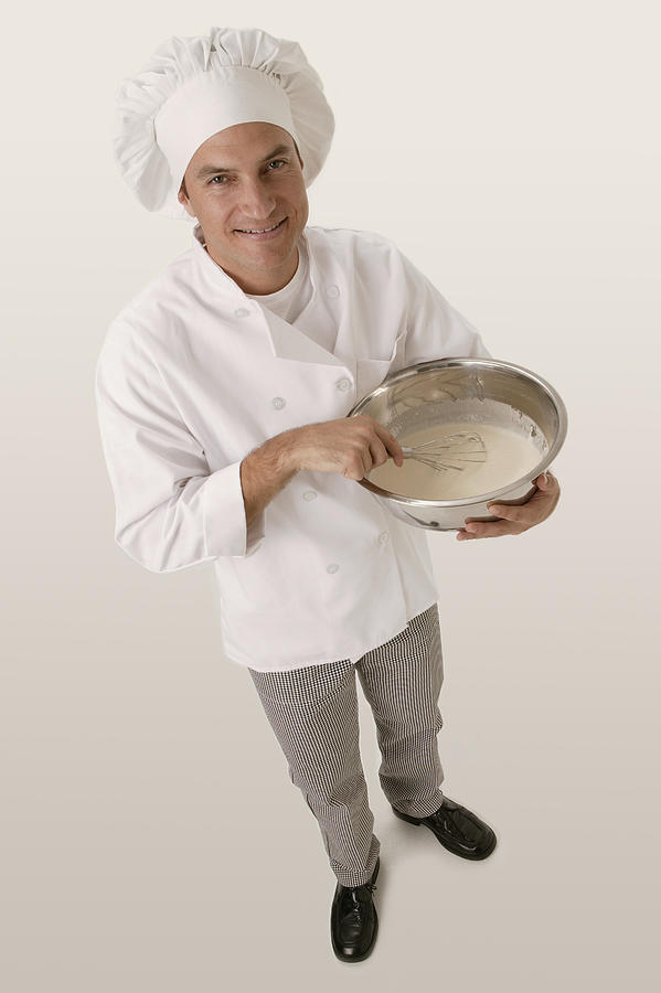 Chef with mixing bowl Photograph by Comstock Images