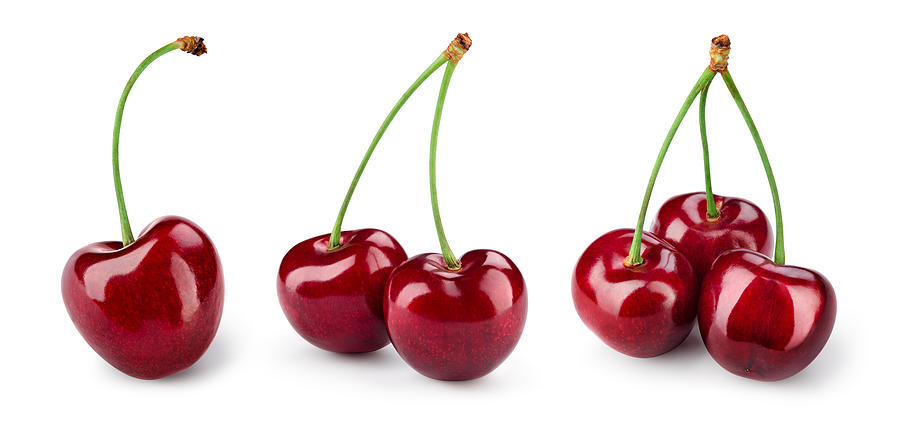 Cherry isolated. Cherries on white. Cherry set. With clipping path. Photograph by Taras Dovhych