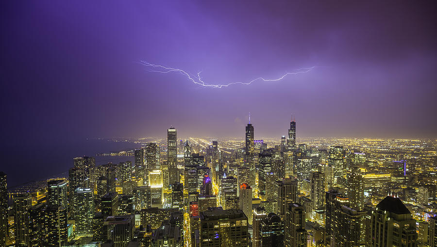 Chicago downtown night panorama during thunderstorm Photograph by Marchello74