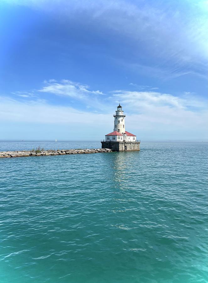 Chicago Harbor Light and the lake of Aqua Waters Photograph by Janice Adomeit