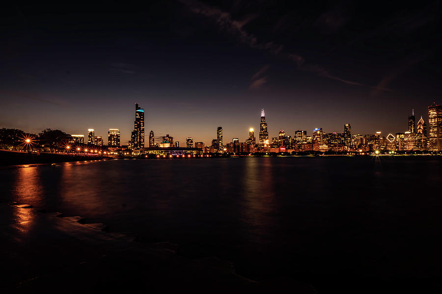 Chicago skyline by the lake at night Photograph by Sven Brogren