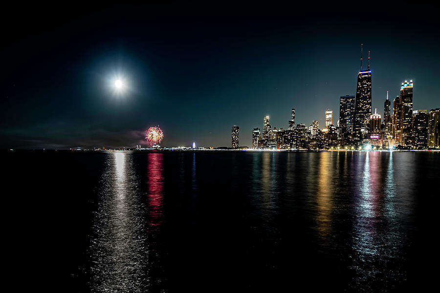 Chicago skyline, moon and fireworks two Photograph by Sven Brogren