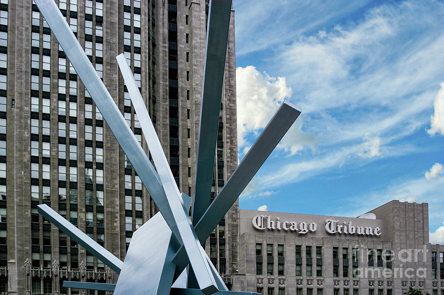 Chicago Tribune building with a work of art in front.  Photograph by Gunther Allen