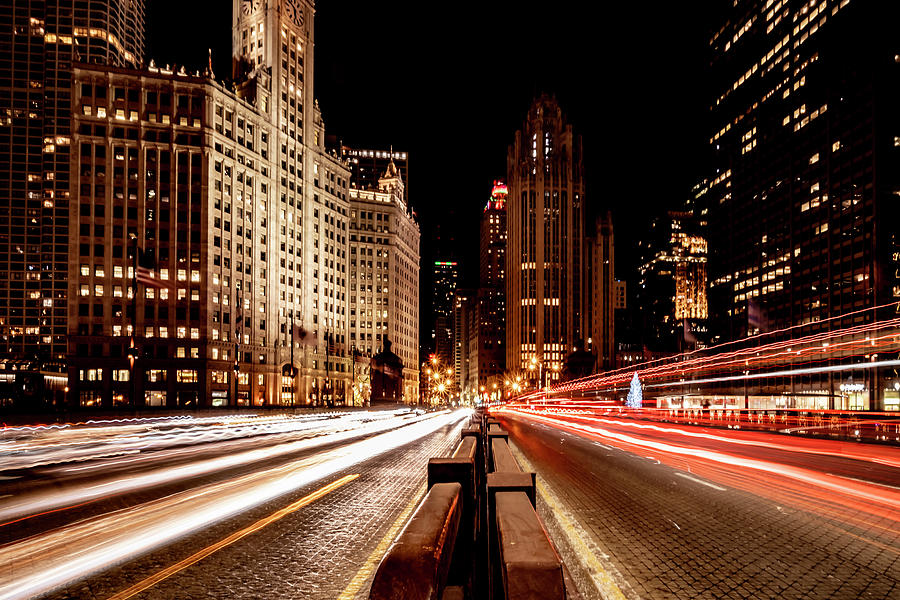 Chicagos Mag mile traffic whizzing by Photograph by Sven Brogren