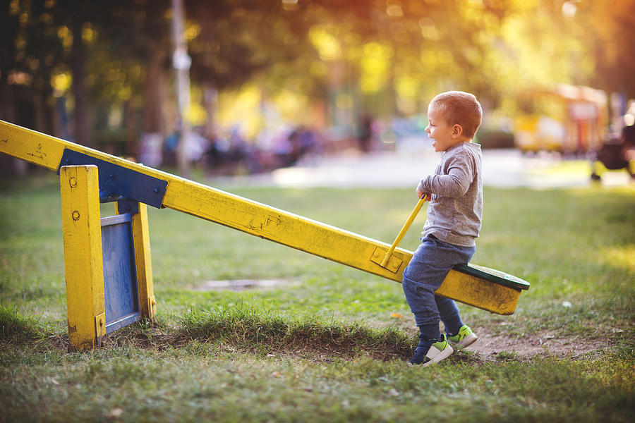 Child on the playground Photograph by Miodrag Ignjatovic