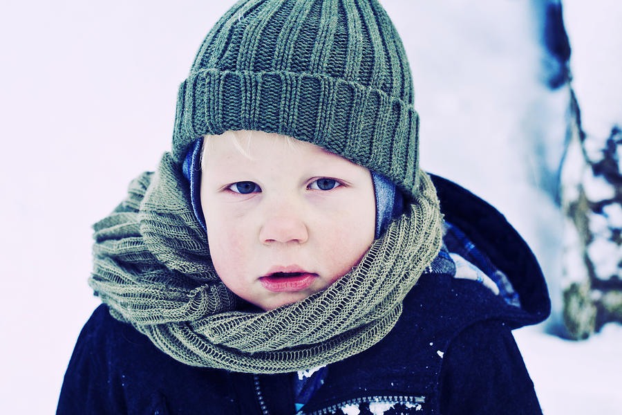 Child outside on snowy day Photograph by Sally Anscombe