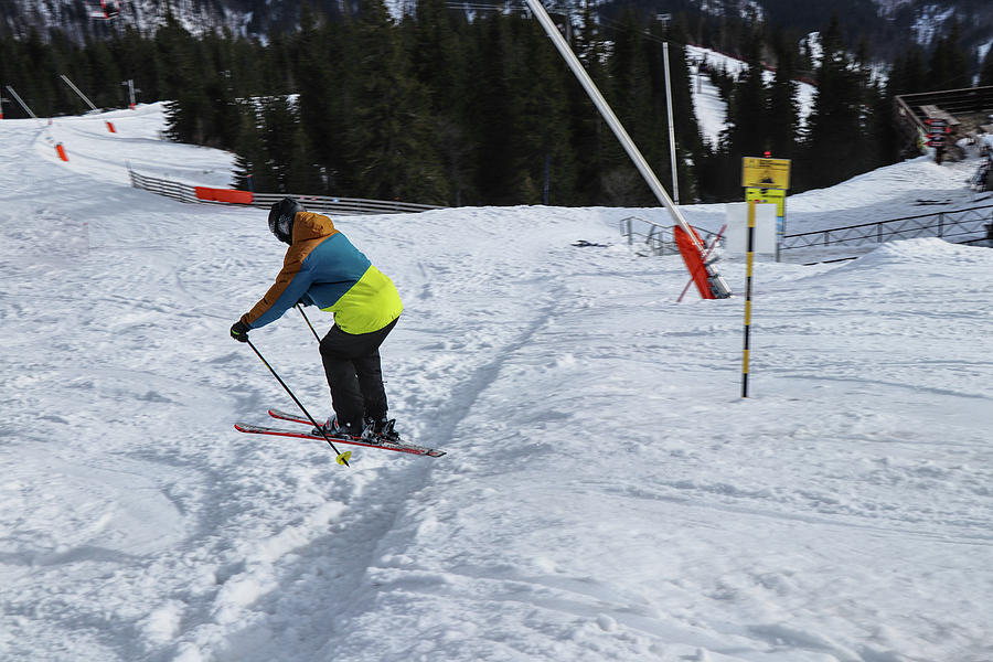 Child skier jumping on downhill in Chopok, Low Tatras, Slovakia. A boy ...